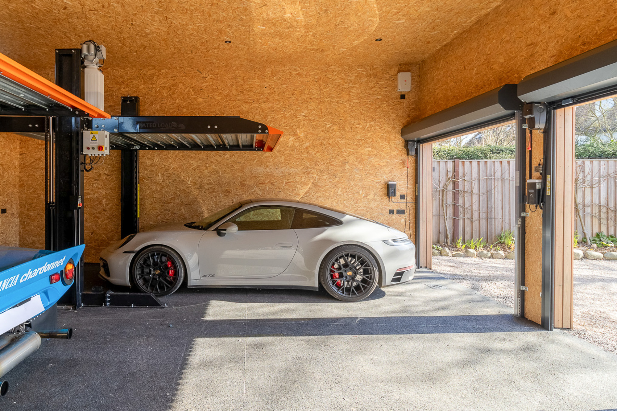 Luxury Garage Design | Electric Stacking Car Storage Systems