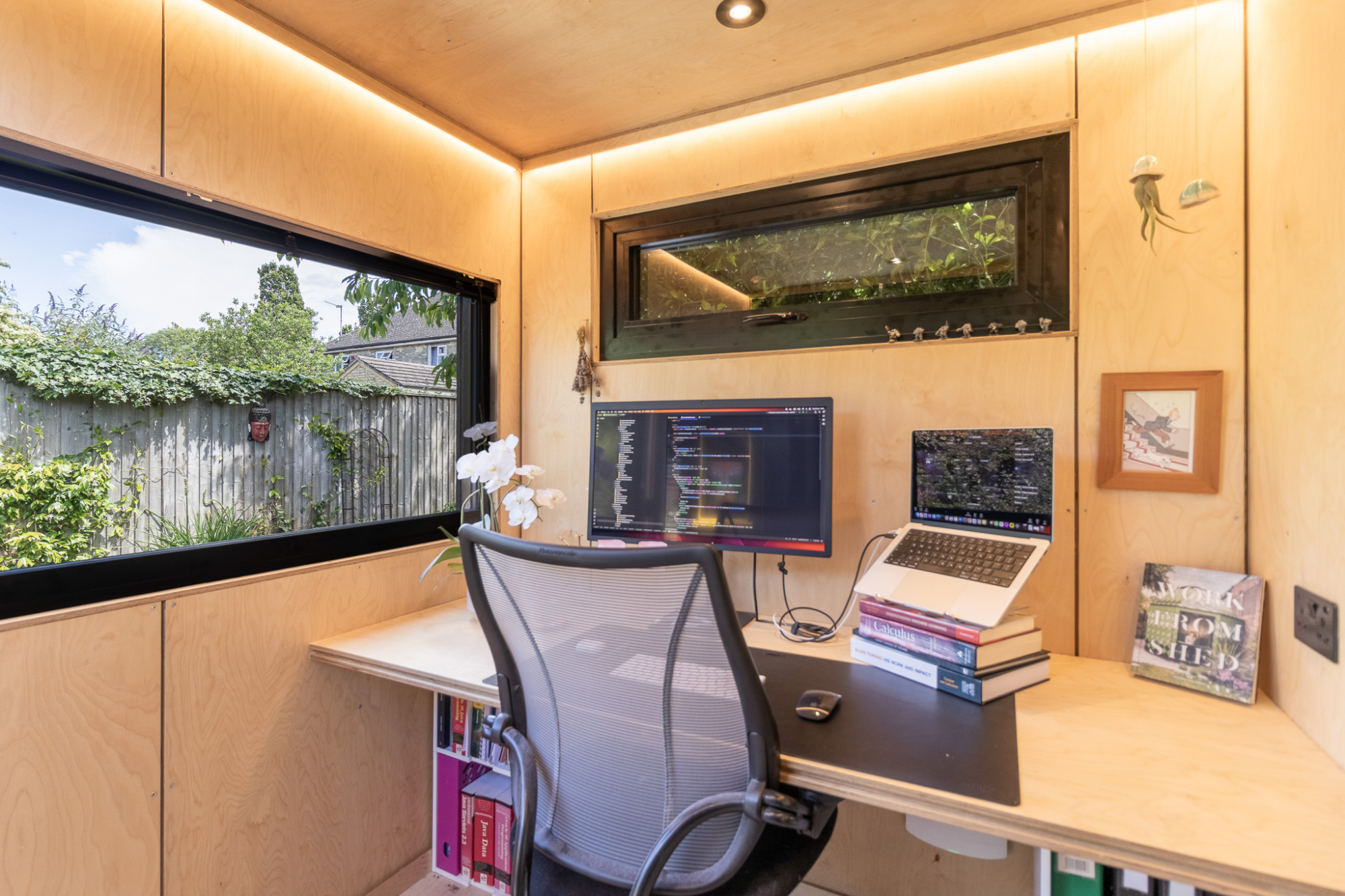 Prefabricated single-person office pod installed in a commercial campus outdoor setting