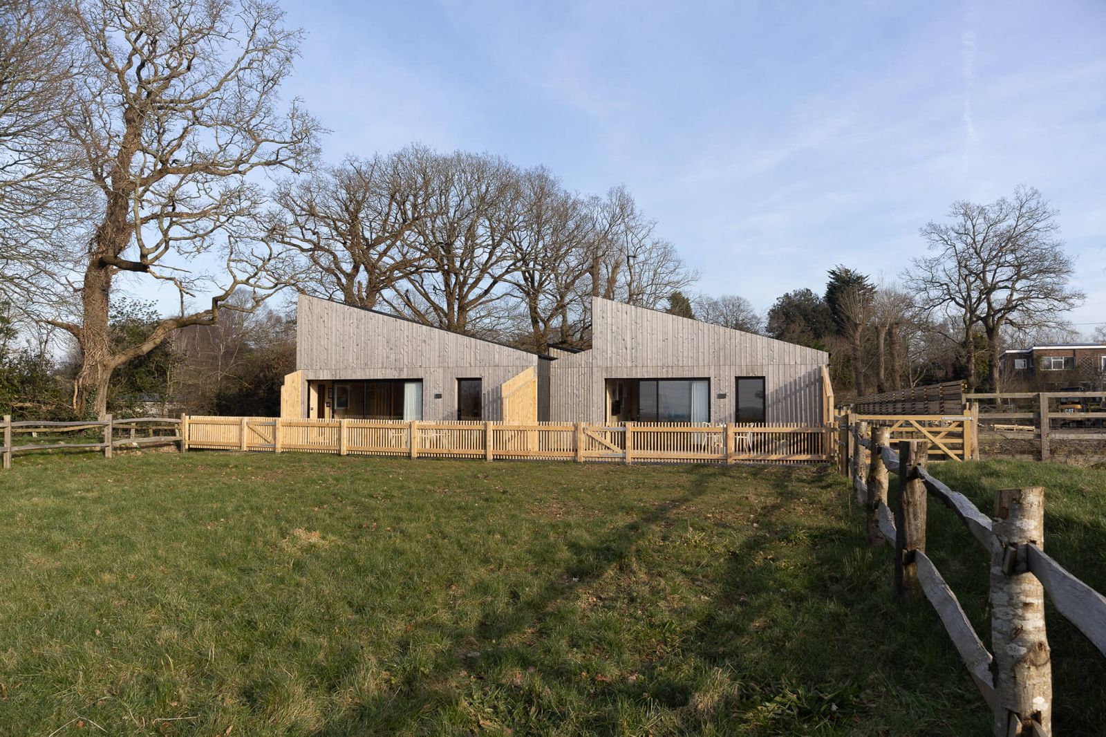 modern wooden cabins built on rural land for airbnb or retreat accommodation with private outdoor space and countryside views