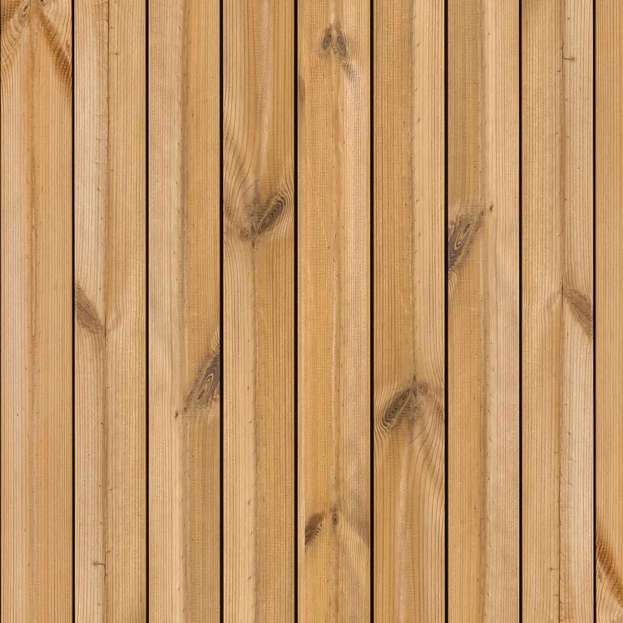 A detailed material swatch of heat-treated Thermowood pine siding, a popular contender for the best backyard room cladding due to its rich grain and rot resistance.
