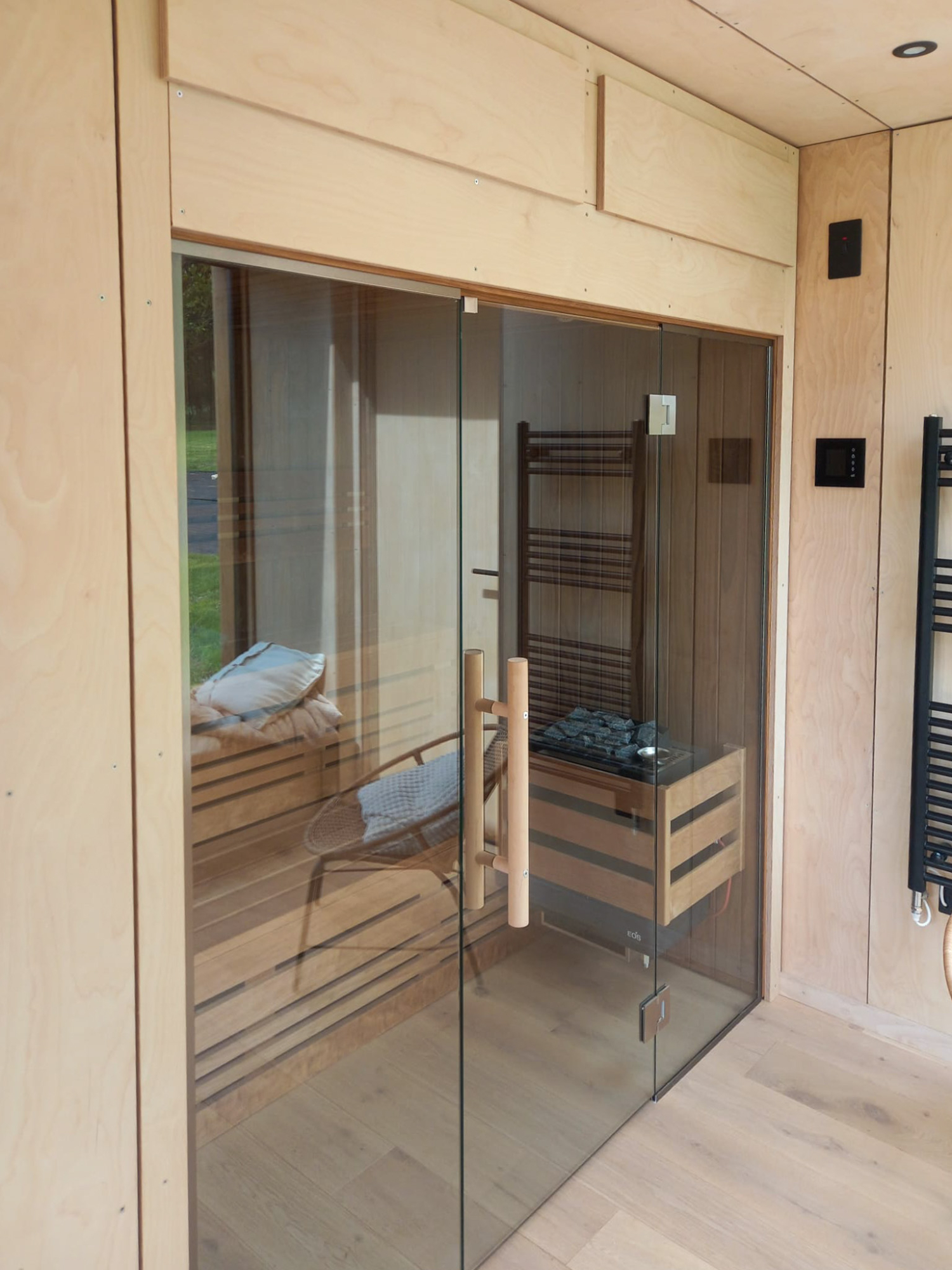 Smart micro-apartment layout inside a luxury garden annex pod, designed for upscale comfort and efficient modern living.
